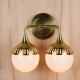Brass Two Light Glass Globe Shaded Wall Scocne #0